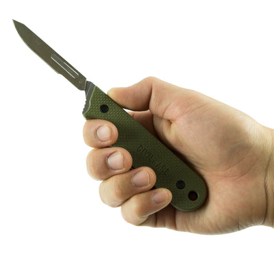 Civilware's Interchangeable Blade Knife in OD Green. Ultralight titanium skinning knife with removable and replaceable surgical blades for easy, precision skinning of big and small game animals, alike.